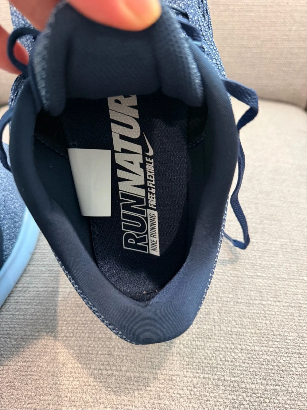 Nike men’s Navy Blue and Light Blue Knit Sneakers